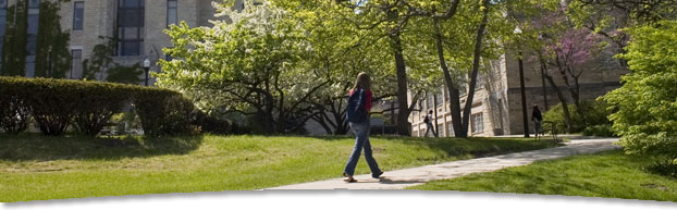 Photo of student walking on campus